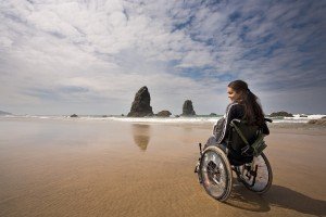 Lawrence Social Security Disability Attorney wheelchair on beach